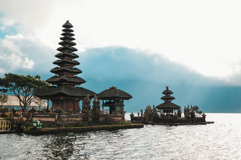 pura-ulun-danu-bratan-bali-hindu-temple-surrounded-by-flowers-bratan-lake